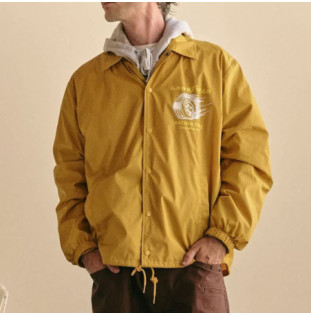 Chaqueta Brixton: Goodyear Slick Wind Breaker (Nugget Gold)