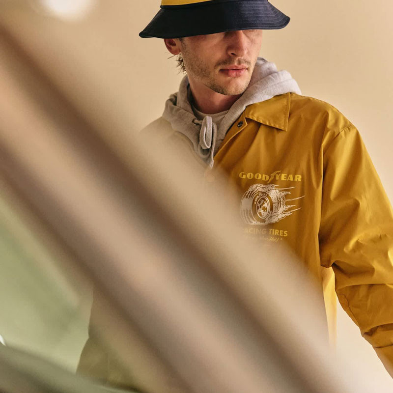 Chaqueta Brixton: Goodyear Slick Wind Breaker (Nugget Gold)